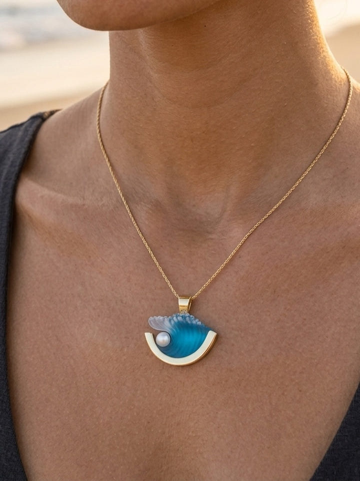 14K Medium Yellow Gold Pearl Wave Pendant — close-up on model