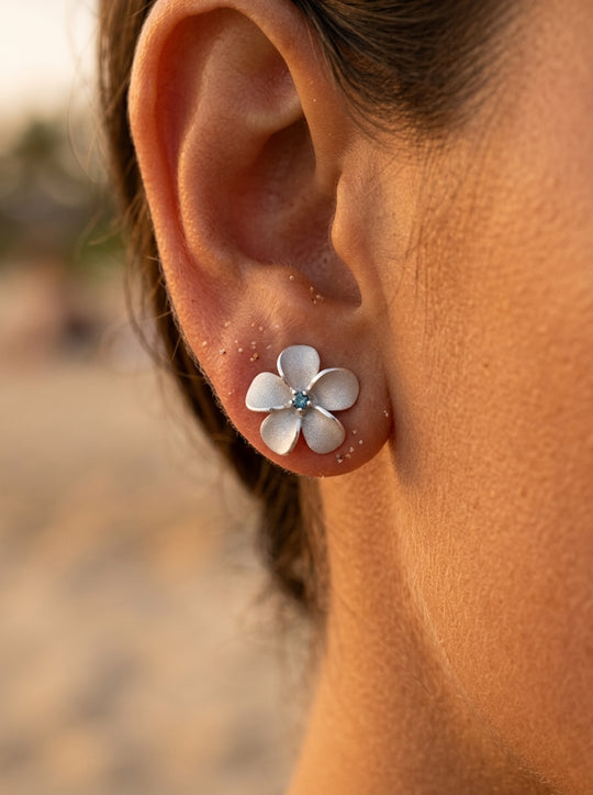 14kw/g 11mm Plumeria Earrings with 2 blue diamonds