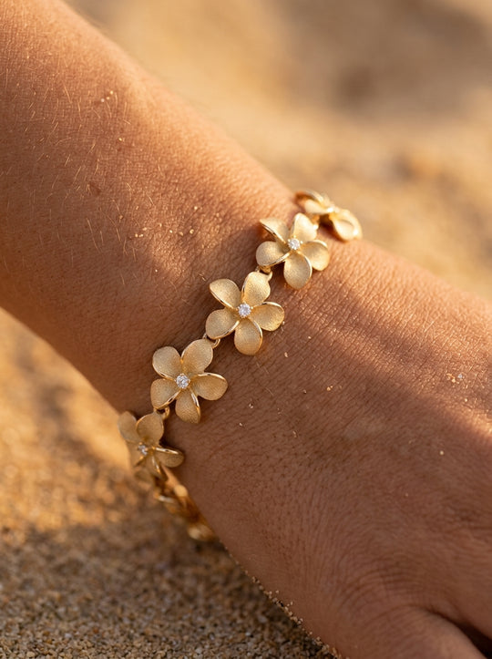11mm 14k Plumeria Bracelet with 13 diamonds and 13 flowers