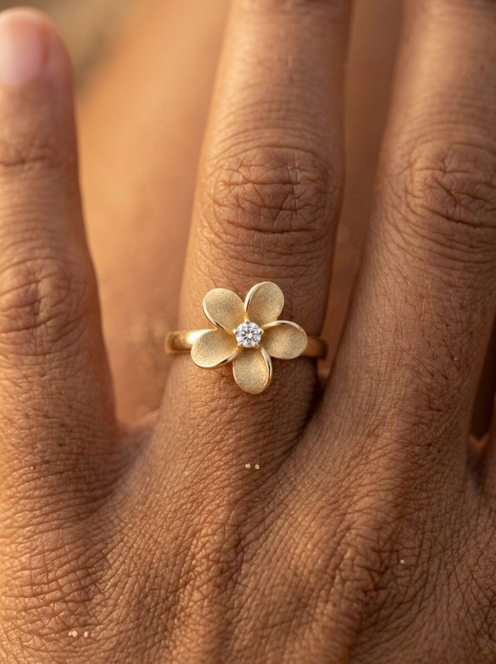 13mm 14k Flower Ring with 0.04 carat diamond — close-up on model