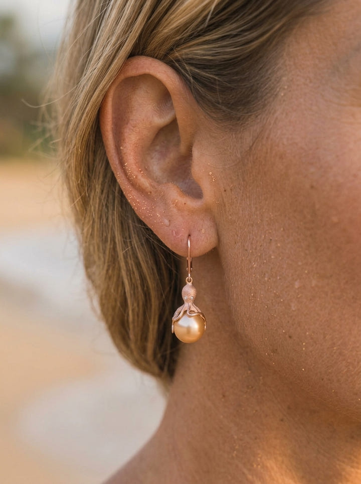 Rose Gold Octopus Earrings With Peach Fresh Water Pearls & Diamonds — close-up on model