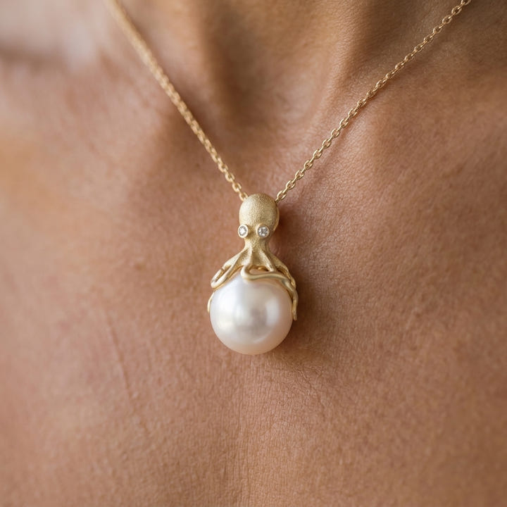 Gold Octopus Pendant With 10mm White Freshwater Pearl & Diamonds — worn on model (brunette, view 2)