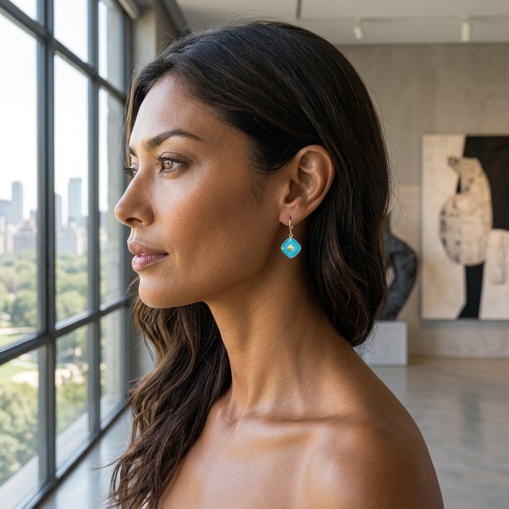 18k Treasure Island Oahu 14mm Earrings — worn on model (brunette, view 1)