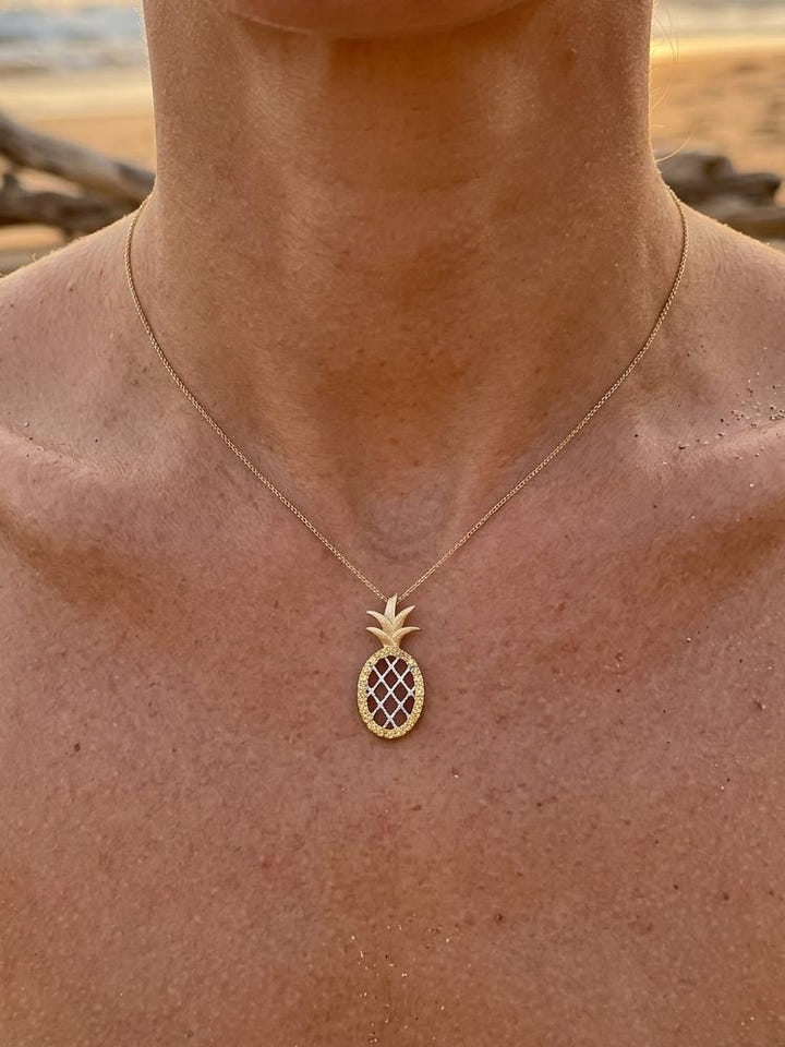 14k "Pineapple" Pendant with 22 Yellow Sapphires — close-up on model