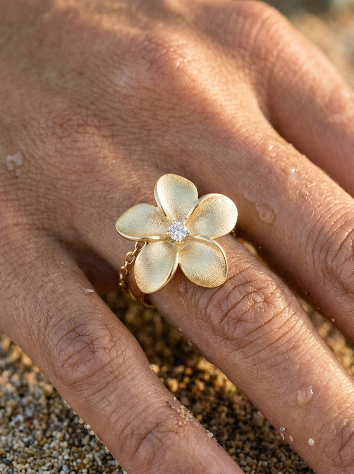 14k 18mm Plumeria Ring with diamond — close-up on model