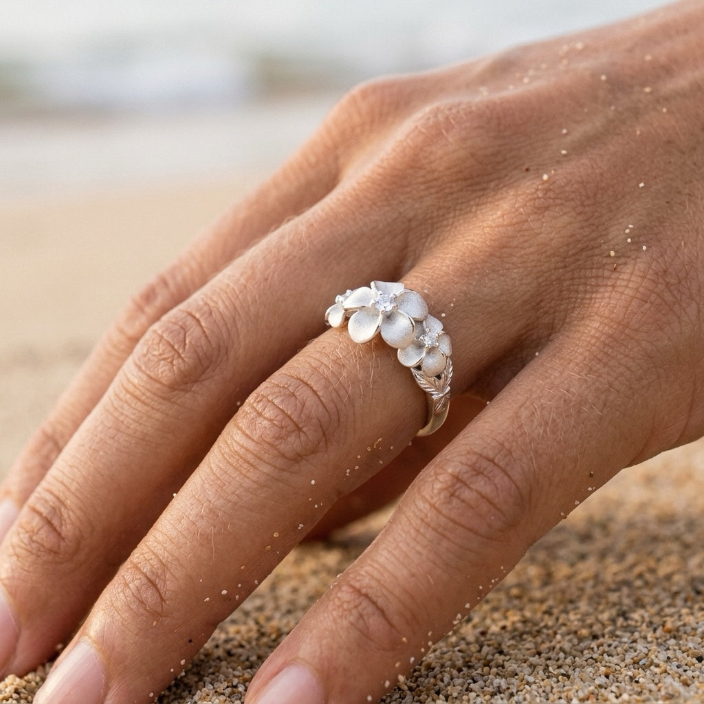 11mm Precious Silver Plumeria Ring with 3 White Sapphire — worn on model (brunette, view 3)