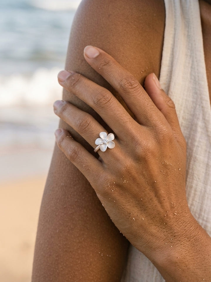 13mm Precious Silver Flower Ring with White Sapphire — close-up on model