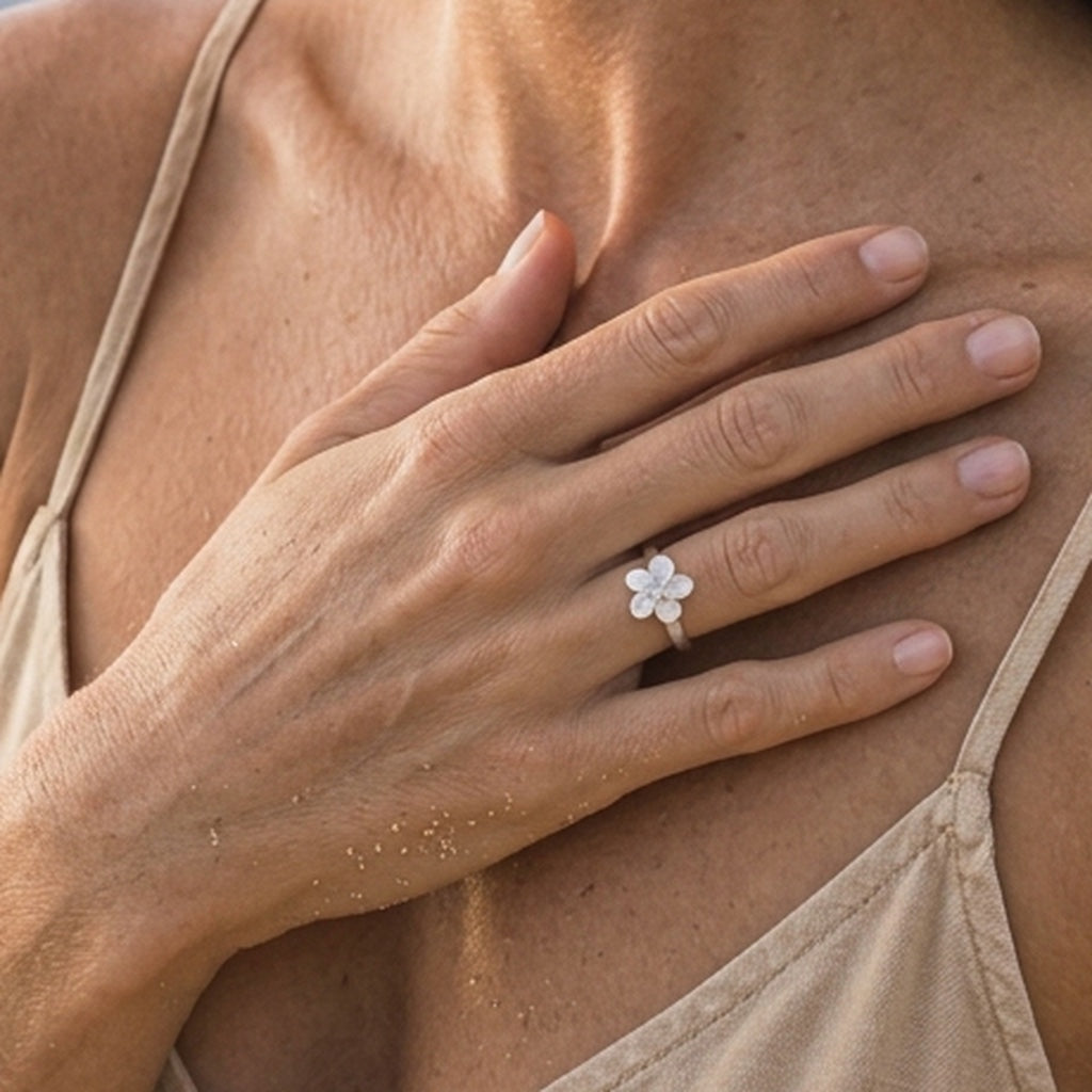 10mm Precious Silver Plumeria Ring with White Sapphire and heavy shank — worn on model (blonde, view 3)