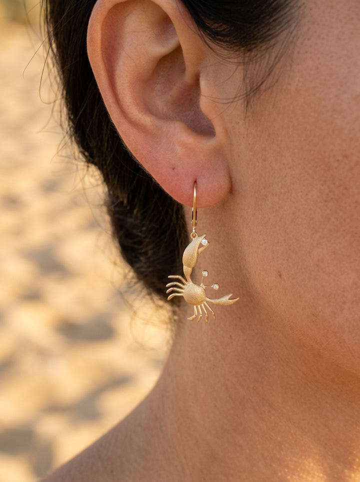 14k 22mm Crab Earrings with 6 Diamonds — close-up on model