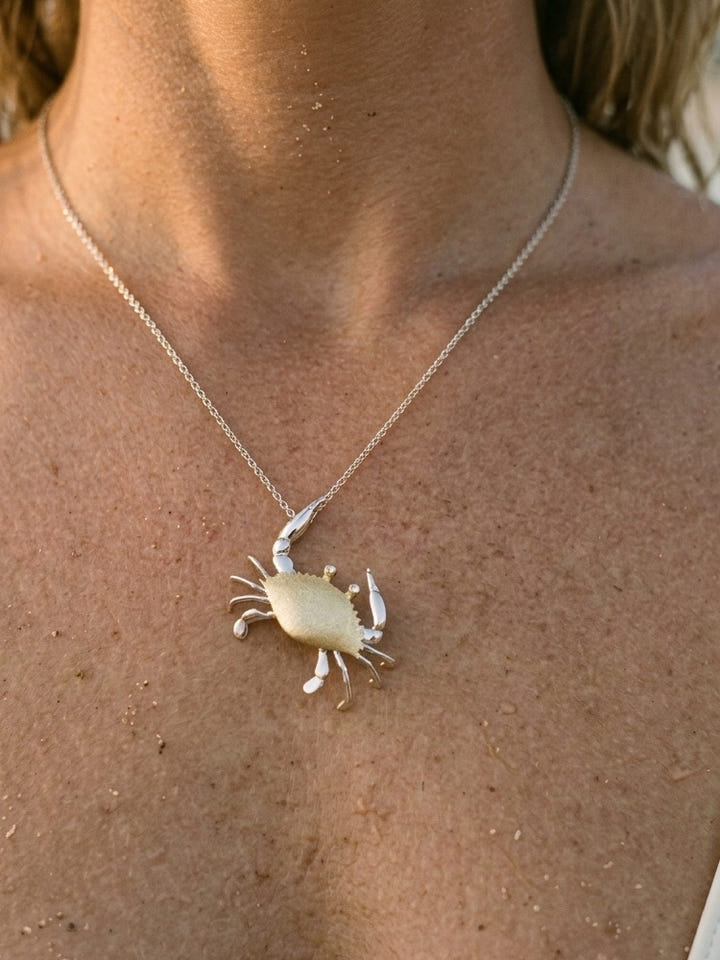14k 28mm Crab Pendant with 2 Diamonds — close-up on model