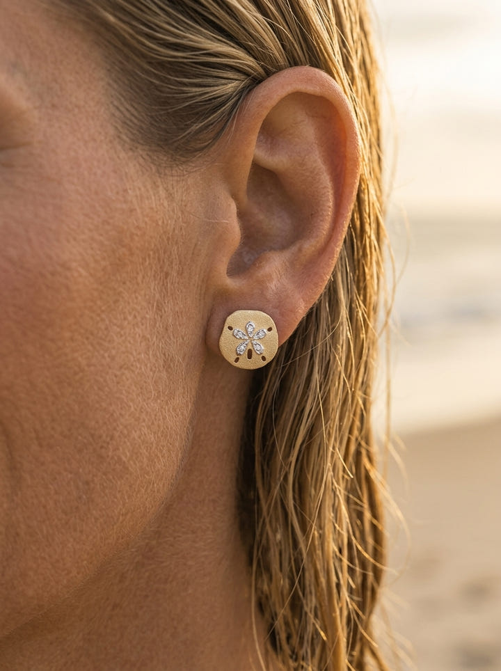 14k 15mm Sand Dollar Earrings with Diamonds — close-up on model