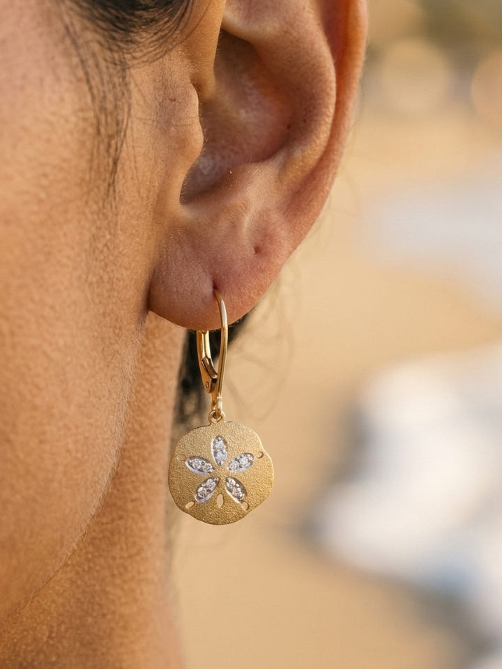 14k 12mm Sand Dollar Earrings with 20 Diamonds — close-up on model