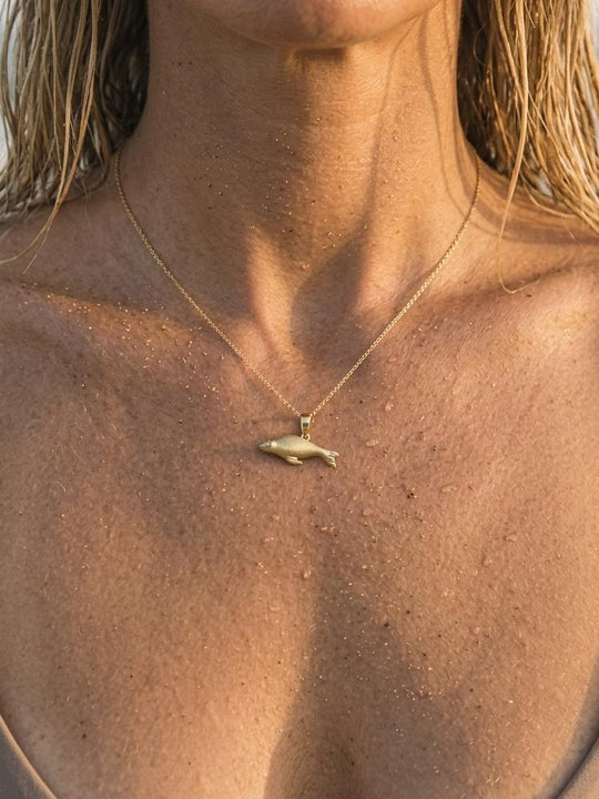 14k 20mm Seal Pendant "Searching" with 2 Diamonds
