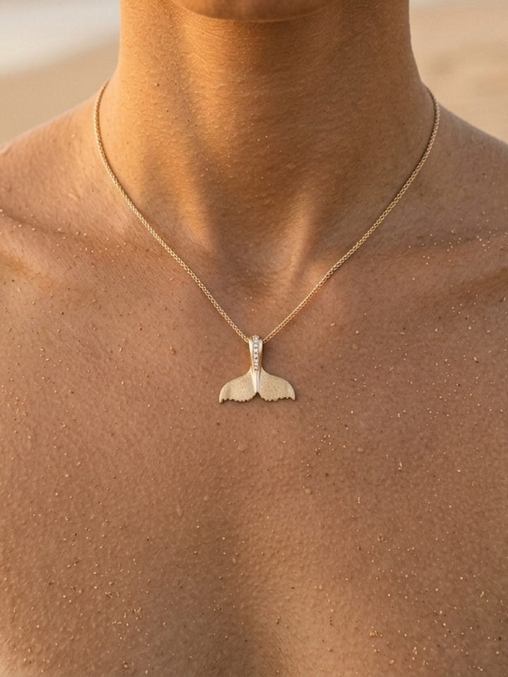 14k 21mm Whale Saw Tail Pendant with 5 Diamonds — close-up on model