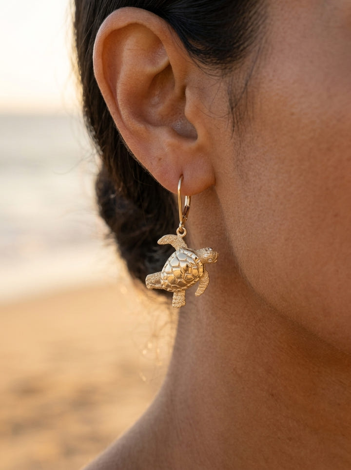 14k 20mm Sea Turtle Earrings with 4 Diamonds — close-up on model