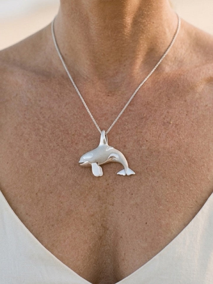 Precious Silver 40mm Killing Whale Pendant — close-up on model