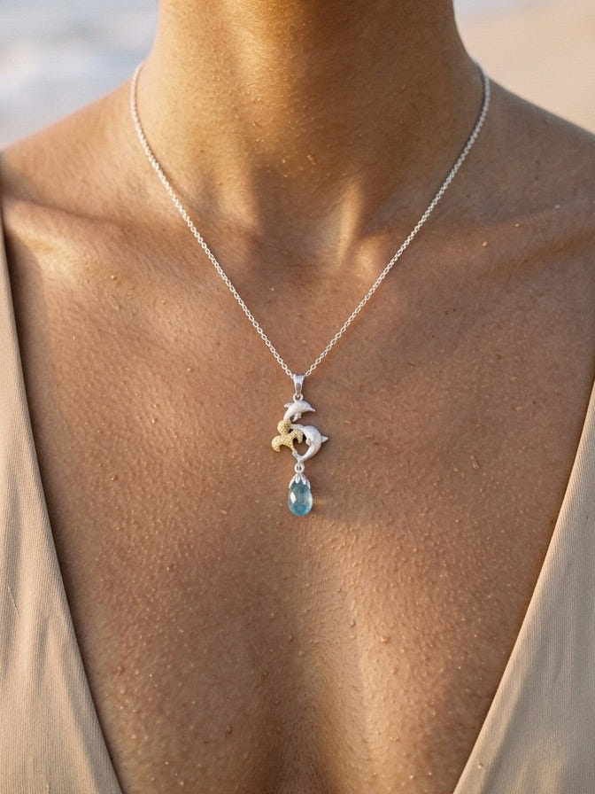 10mm Precious Silver 18k "Dancing Couple" Dolphin Pendant — close-up on model