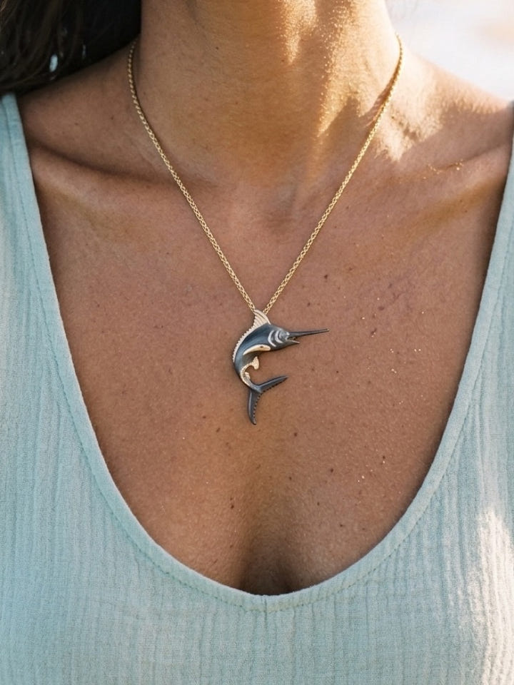 PRECIOUS SILVER/14KY (BLACK & YELLOW) 40MM BLUE MARLIN PENDANT W/2 DIA. 0.02ct T/W — close-up on model