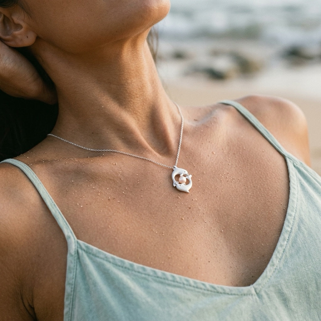 Precious Silver 15mm "Chasing Couple" Dolphin Pendant — worn on model (brunette, view 3)