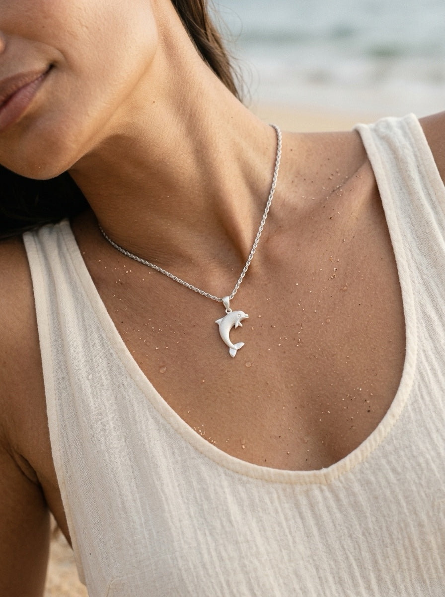 Precious Silver 20mm "Jumping Single" Dolphin Pendant — worn on model (brunette, view 3)