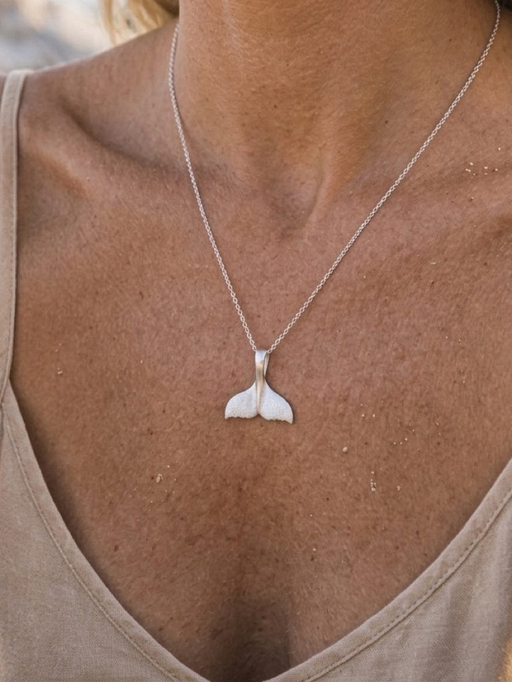 Precious Silver 16mm Whale Saw Tail Pendant — close-up on model
