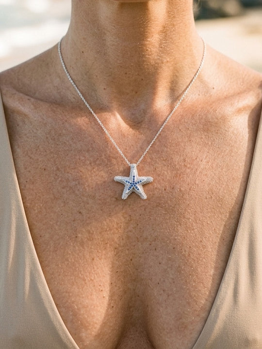 Precious Silver 18mm Starfish Pendant with 16 Blue Sapphires