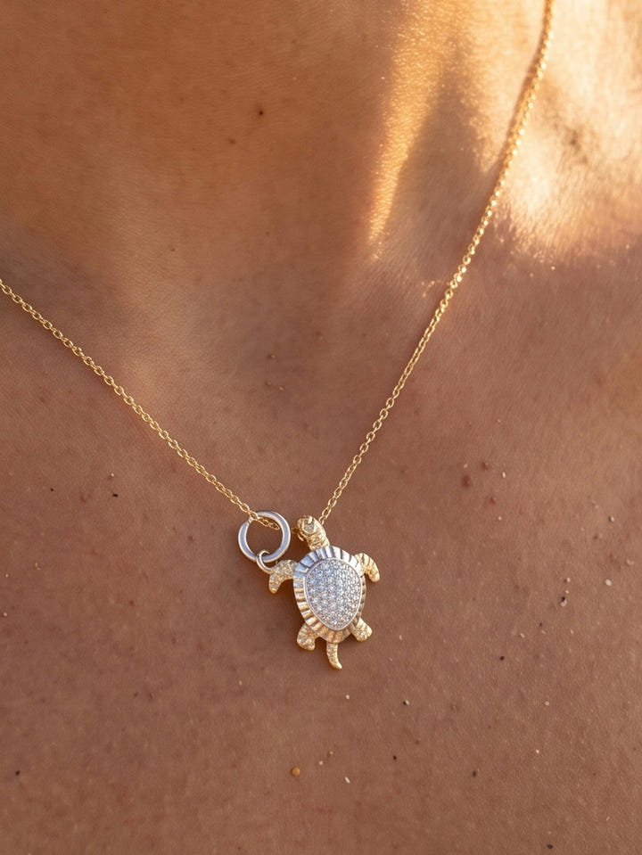 14k 2/tone 17mm Sea Turtle Charm with 21 Diamonds — close-up on model
