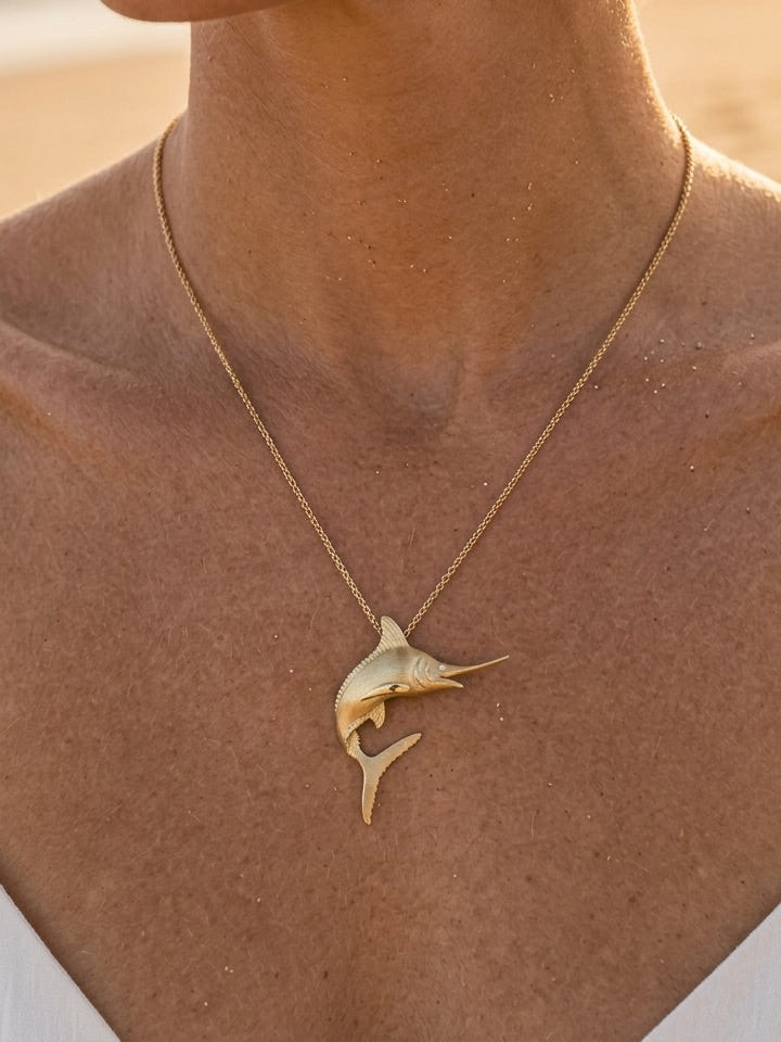 14k 40mm Blue Marlin Pendant with 2 Diamonds — close-up on model
