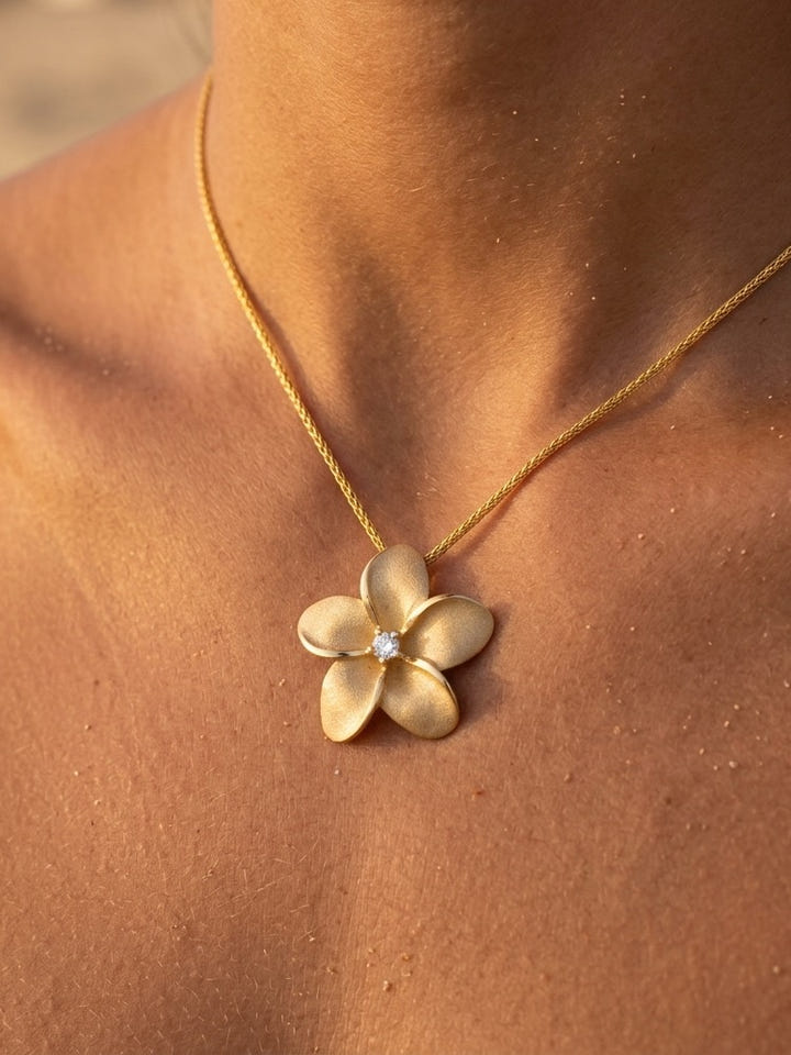 24mm 14k Plumeria Diamond Pendant — close-up on model