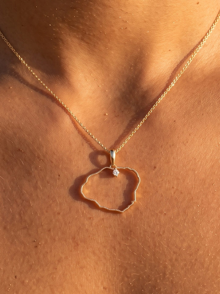 14ky "Kauai" Pendant with .03ct Diamond (for HANALEI) — close-up on model