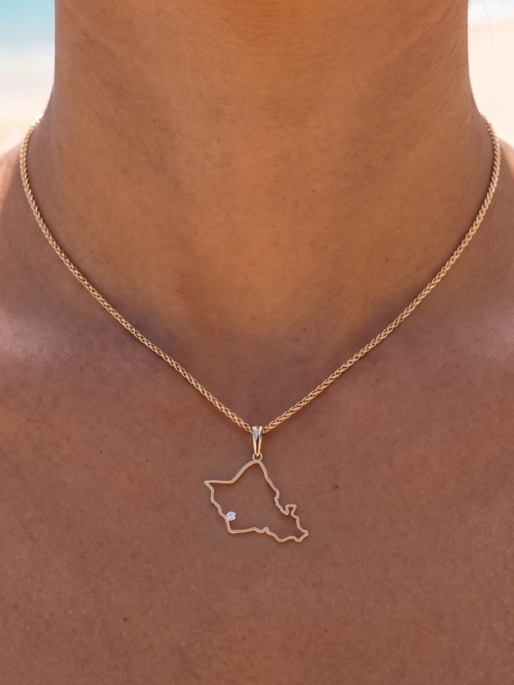 14ky "Oahu" Pendant with .03ct Diamond (for KO'OLINA) — close-up on model