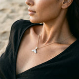 Precious Silver/14KY 15mm Whale Tail Pendant with Black Rhodium — worn on model (brunette, view 3)