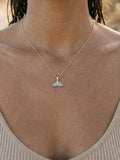 Precious Silver/14KY 25mm Whale Tail Pendant with Black Rhodium — close-up on model