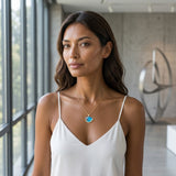 14K Medium Yellow Gold Wave Pendant with Diamond — worn on model (brunette, view 1)