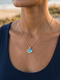 14K Small Yellow Gold Wave Pendant with Diamond — close-up on model