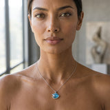 14K Large White Gold Pearl Wave Pendant — worn on model (brunette, view 1)