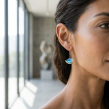 14k Yellow Gold Wave Earrings With .02ct Diamonds — worn on model (brunette, view 2)