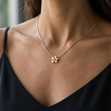 14k 2/tone Plumeria Lei Necklace with 5 diamonds — worn on model (brunette, view 3)