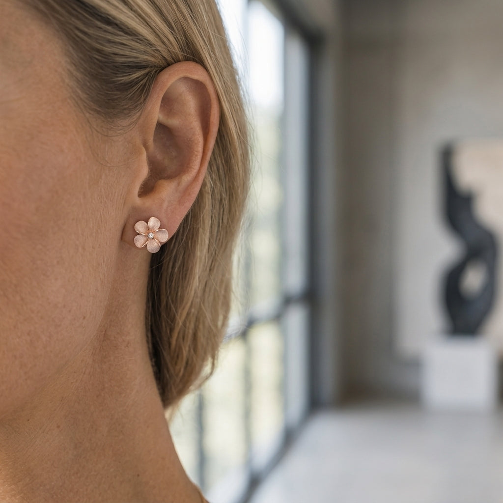 14k 11mm Plumeria Diamond Earrings — worn on model (blonde, view 2)