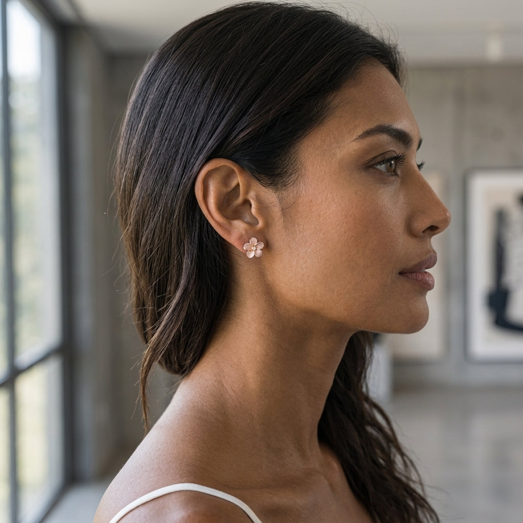 14k 11mm Plumeria Diamond Earrings — worn on model (brunette, view 2)