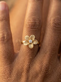 13mm 14k Flower Ring with 0.04 carat diamond — close-up on model