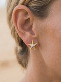 14k 16mm Starfish Earrings with 22 Diamonds — close-up on model