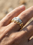 14k 2/tone 15mm "Flipping Couple" Dolphin Ring with blue diamonds — close-up on model