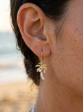 14k 2/tone 15mm Palm Tree Earring with 12 Diamonds — close-up on model
