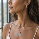 14K Yellow Gold Octopus Pendant with Diamond — worn on model (brunette, view 1)