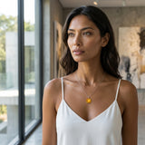 14K White Gold Sun Pendant — worn on model (brunette, view 1)