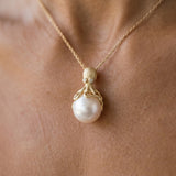 Gold Octopus Pendant With 10mm White Freshwater Pearl & Diamonds — worn on model (brunette, view 2)