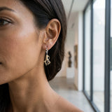 14k 2/tone Octopus Earring with 12 Diamonds — worn on model (brunette, view 2)