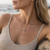 14k 2/tone Fish Bone Pendant with 8 Diamonds — worn on model (blonde, view 3)