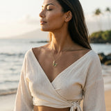 14k Crab Pendant with 2 Diamonds and 14 Tsavorites — worn on model (brunette, view 1)